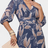 Aisha Maxi Floral Dress with Flowy Silhouette and Leaf Pattern