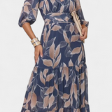 Aisha Maxi Floral Dress with Flowy Silhouette and Leaf Pattern