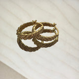 Twisted Hoop Earrings with a Twist Style