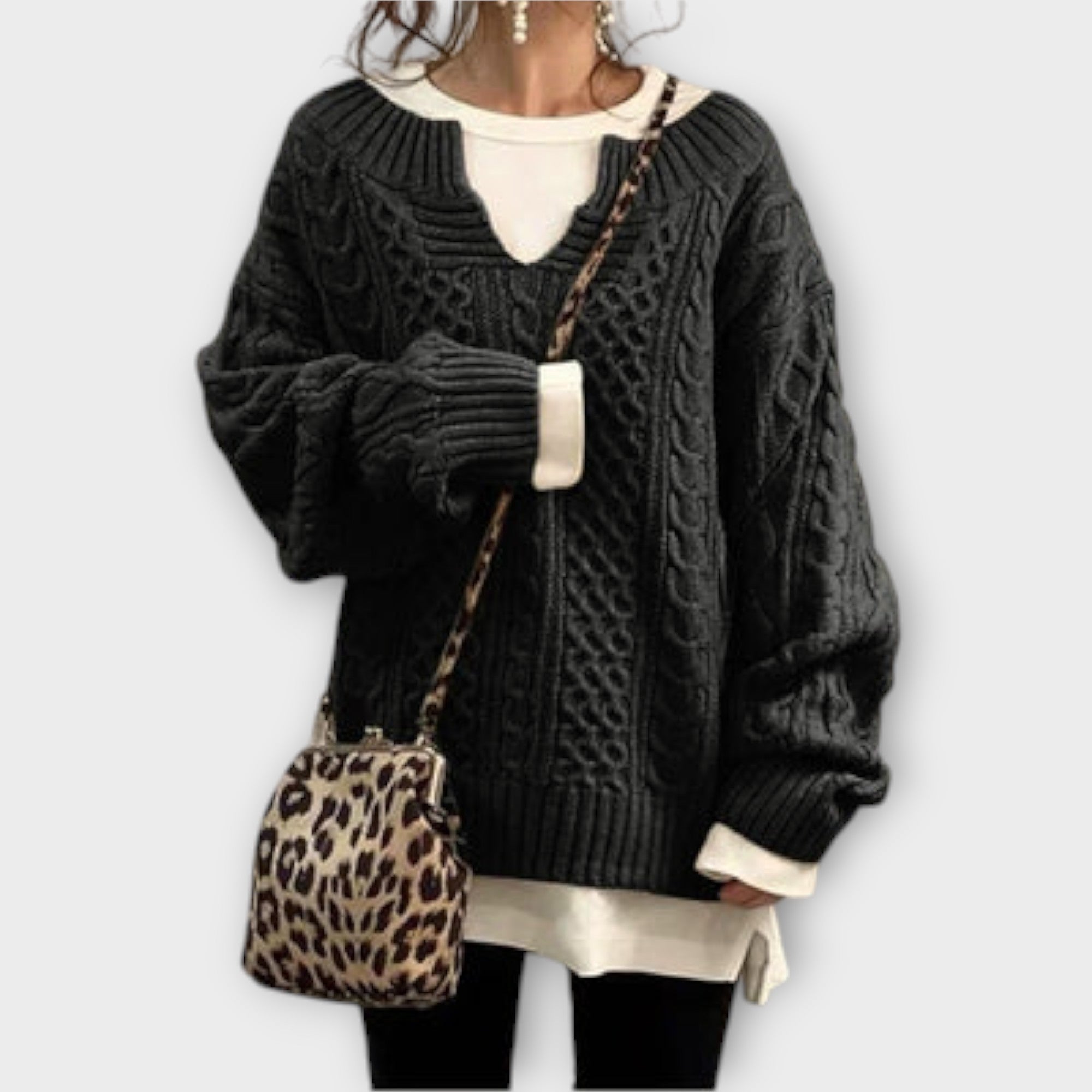 Camisola de malha superdimensionada com padrão de cabo