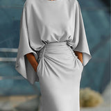 Vasso | Elegant V-neck dress with open back