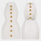 Yvonne Mini Dress with Tied Neck, Open Back and Floral Detail