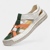 Ergonomic Kaia synthetic leather sandals cut at the side